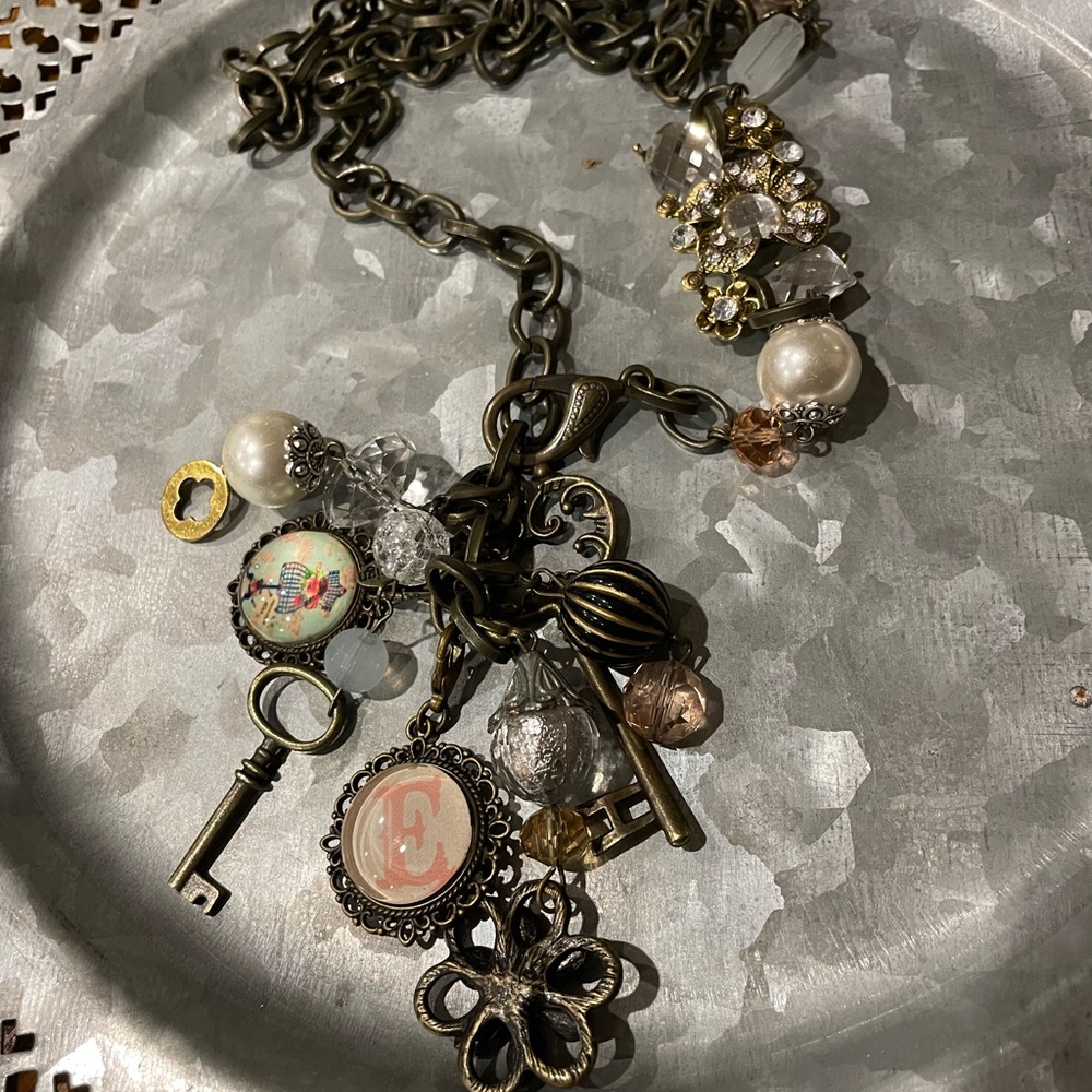 Plunder brass long necklace with charms